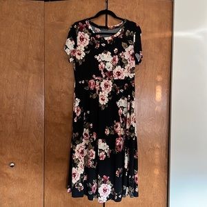Floral short sleeve length dress.